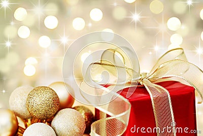 Christmas gift on defocused lights background Stock Photo