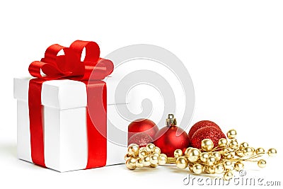 Christmas gift with red balls bow Stock Photo