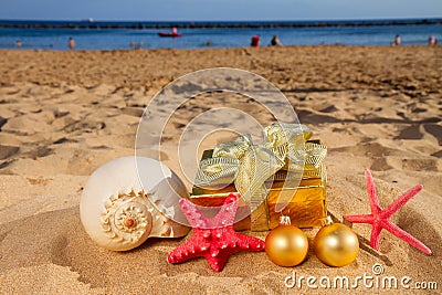 Christmas gifts on beach Stock Photo