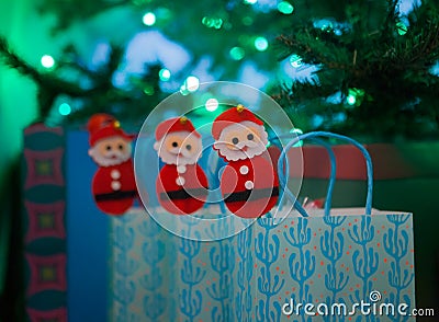 Christmas gifts near the christmastree with snowmans. Christmas background. New Year interior design. Decorated tree Stock Photo