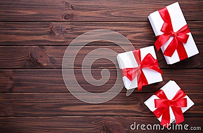 Christmas gifts presents on a brown background. Stock Photo