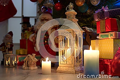 Christmas gifts and toys placed under Christmas tree. Stock Photo