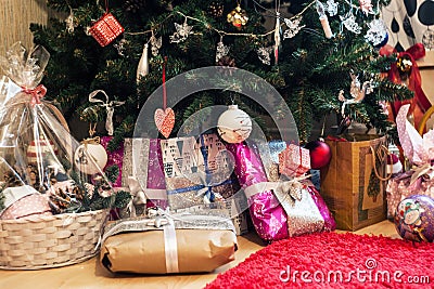 Christmas gifts under the tree. New Year home interior merry Christmas and happy new year concept Stock Photo