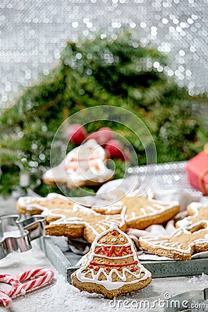 Christmas gingerbread cookies with icing ornate. Xmas decorations, white background. Stock Photo