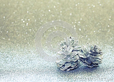 Christmas glitter background, three silver pine cone Stock Photo