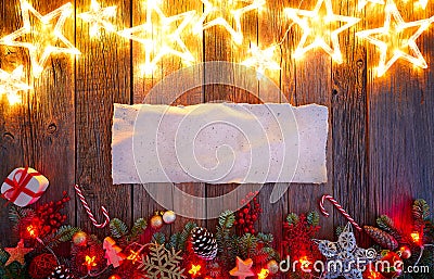 Christmas glow stars and fir white paper Stock Photo