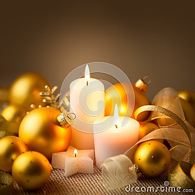 Christmas Golden Candles Decoration with Glitter and Baubles Stock Photo