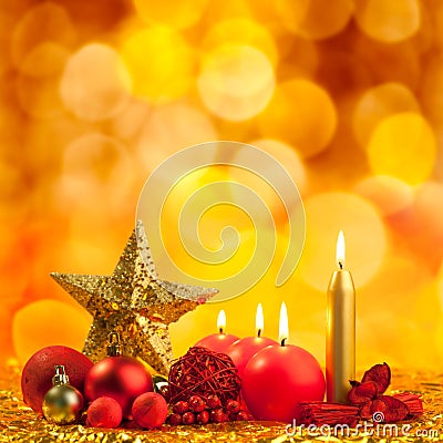 Christmas golden star with red candles Stock Photo