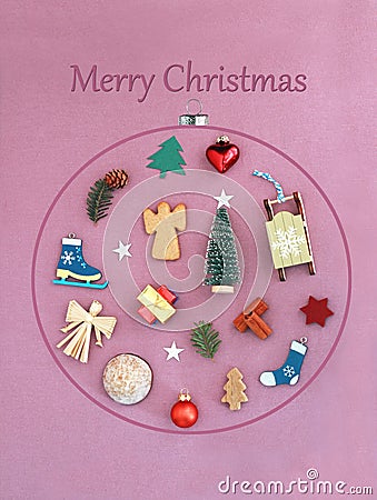 Christmas greeting card with a large christmas bauble with many christmas objects in it Stock Photo