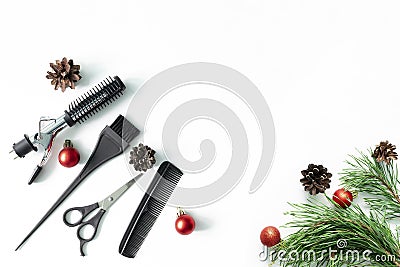 Christmas hairdresser composition with combs, brush, scissors, tools and accessories with new year decorations on white Stock Photo