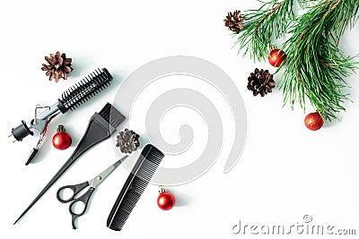 Christmas hairdresser composition with combs, brush, scissors, tools and accessories with new year decorations on white Stock Photo