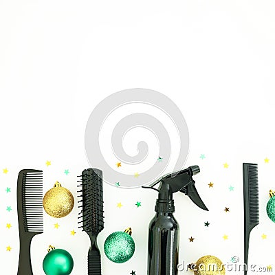 Christmas hairdresser composition with spray, combs and decoration on white background. Flat lay, top view Stock Photo