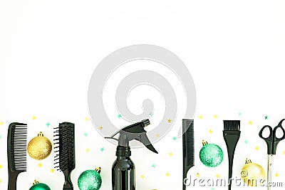 Christmas hairdresser composition with spray, combs, scissors and decoration on white background. Flat lay, top view Stock Photo