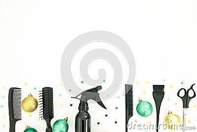 Christmas hairdresser frame with spray, combs, scissors and decoration on white background. Stylish holiday concept. Flat lay, top Stock Photo