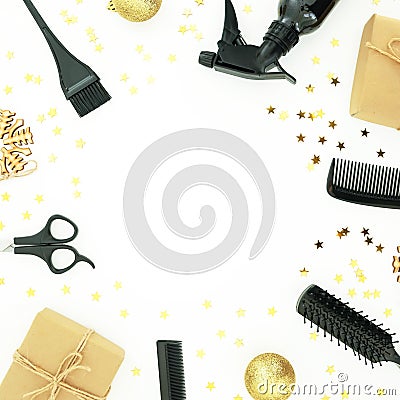 Christmas hairdresser frame with spray, combs, scissors and gift box with decoration on white background. Stylish concept. Flat la Stock Photo