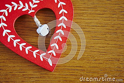 Christmas handmade wooden heart in red and white color Stock Photo