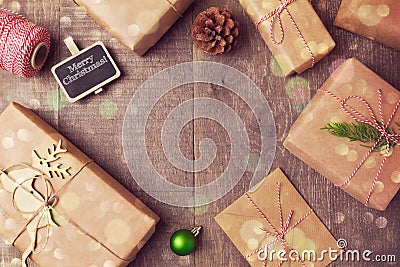 Christmas handmade wrapping gift boxes background. View from above Stock Photo