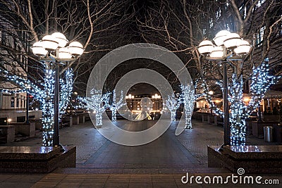 Christmas has arrived to this square in Canary Wharf Stock Photo