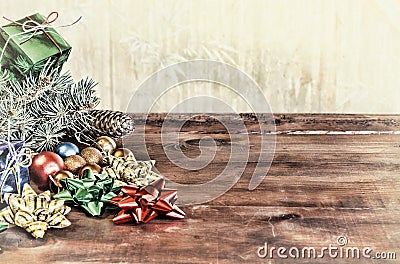 Christmas holiday background with empty wooden deck with a table decorated with a Christmas tree branch fluffy and colorful gift b Stock Photo