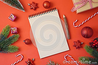 Christmas holiday background with notebook and decorations on re Stock Photo