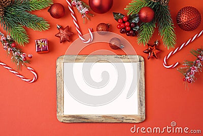 Christmas holiday background with photo frame, decorations and o Stock Photo