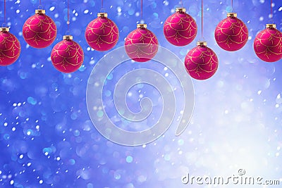 Christmas holiday balls hanging over blue boke background with copy space Stock Photo
