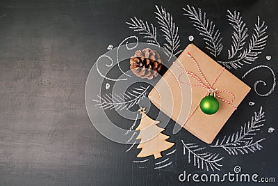 Christmas holiday gift on chalkboard background. View from above with copy space Stock Photo