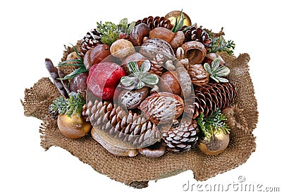 Christmas homemade garland made of natural forest objects - cones, acorns and nuts isolated macro Stock Photo