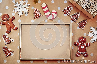 Christmas homemade gingerbread cookies with mock up frame. Homemade baking cookies. Festive aesthetic card. Christmas Stock Photo