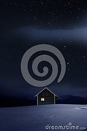 Christmas Illuminated hut in cold winternight Stock Photo