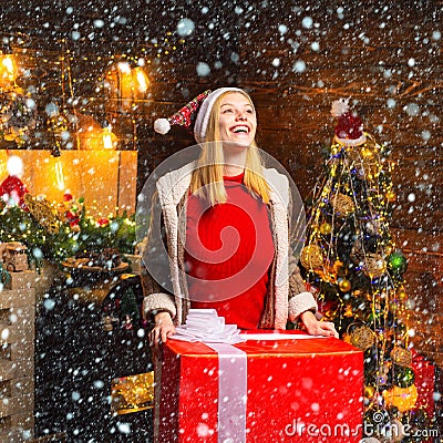 Christmas joy. Woman wooden interior christmas decorations garland lights. Christmas tree. Pleasant moments. Filled with Stock Photo