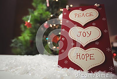 Christmas label with massages of peace, joy and hope Stock Photo