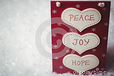 Christmas label with massages of peace, joy and hope Stock Photo