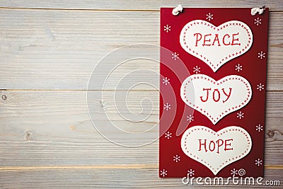 Christmas label with massages of peace, joy and hope Stock Photo