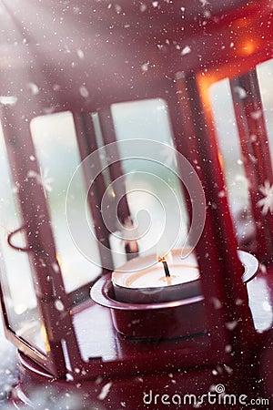 Christmas lantern with candle, snow, christmas decorations Stock Photo