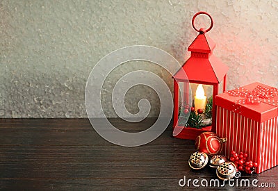 Christmas lantern red with gift box and silver bells Stock Photo