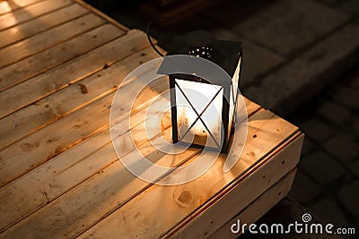 Christmas lantern on the wooden table Stock Photo