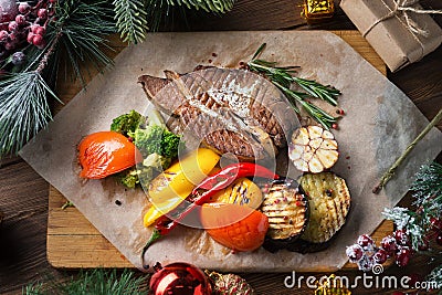 Christmas layout of meat steak with vegetables Stock Photo