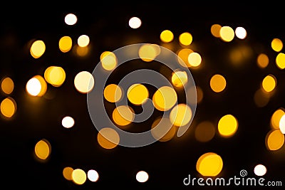Christmas light background. Holiday glowing backdrop. Defocused Background With Blinking Stars. Blurred Bokeh Stock Photo