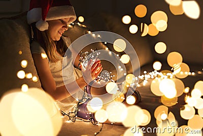 Christmas lights and a child Stock Photo