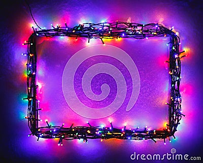 Christmas lights frame on snow background, purple color Stock Photo