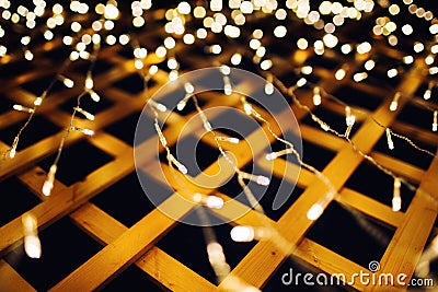 Christmas lights on house background texture in city Stock Photo