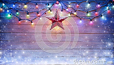 Christmas Lights And Star Hanging Stock Photo