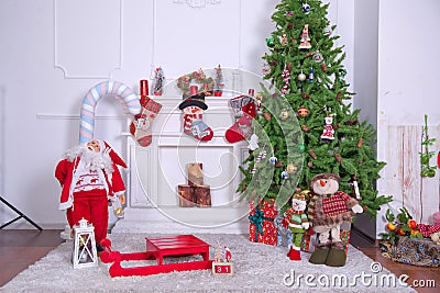 Christmas loft style interior. Soft toy bear on background of Christmas tree .Decorated Christmas room with beautiful tree . New Stock Photo