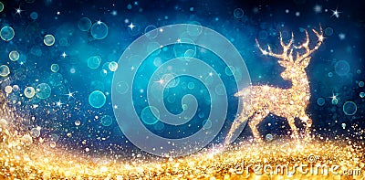 Christmas - Magic Golden Deer In Shiny Blue Stock Photo