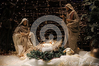 Christmas Manger scene with figures including Jesus Stock Photo