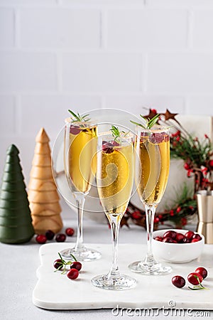 Christmas mimosas with apple cider and champagne or sparkling wine, festive Christmas cocktails Stock Photo