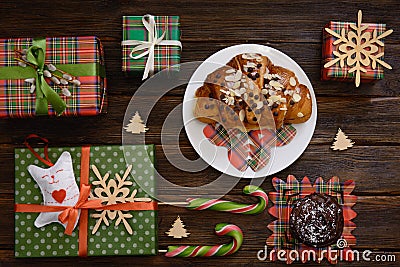 Christmas morning table with croissant and gifts. Top view Stock Photo