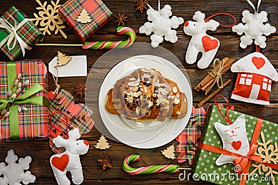 Christmas morning table with croissant and gifts. Top view Stock Photo