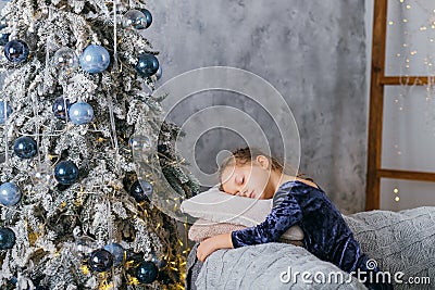 Christmas morning little girl waiting santa fir tree Stock Photo